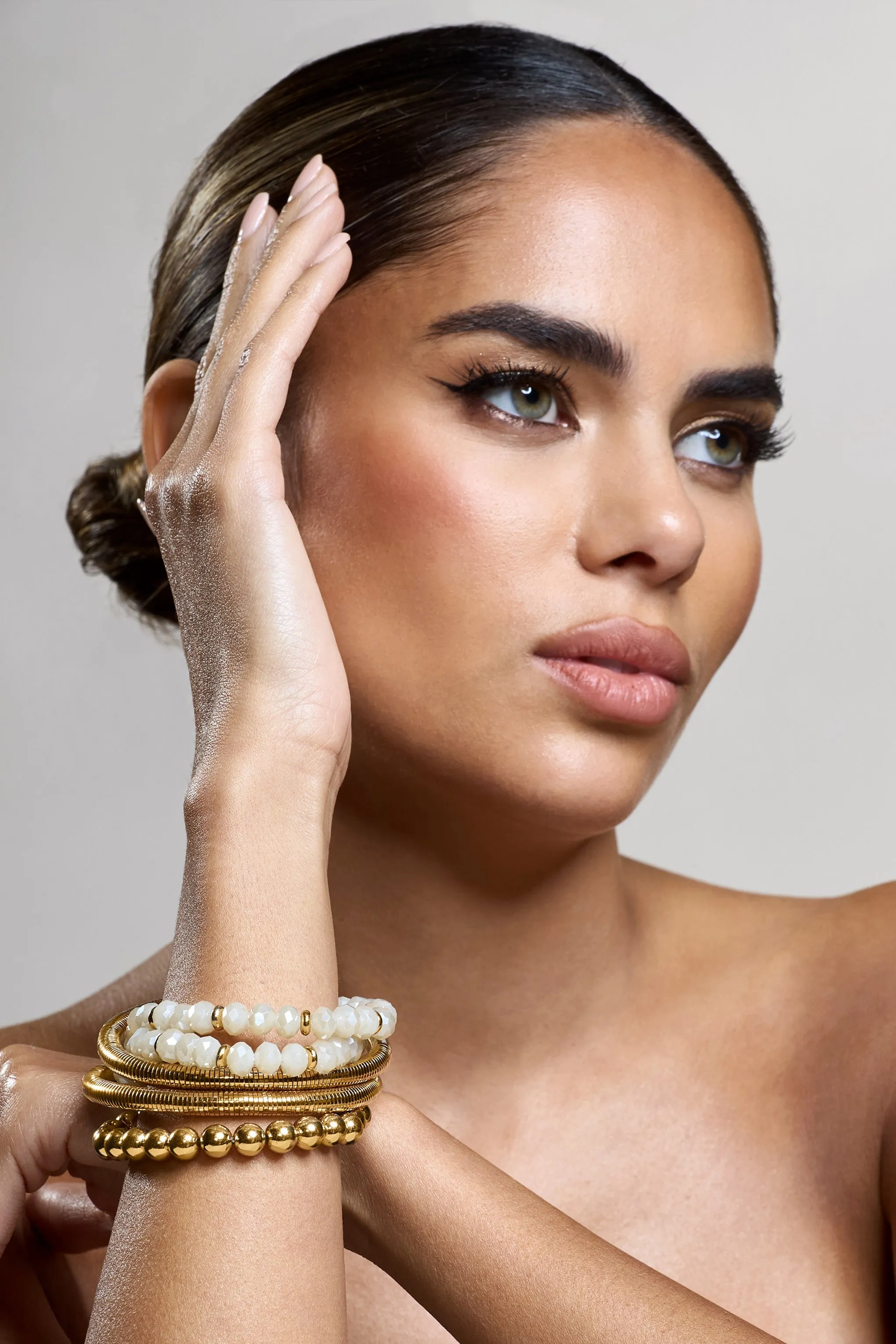 The Sum Of Us | Gold Beaded Bracelet Stack sold by Club L London