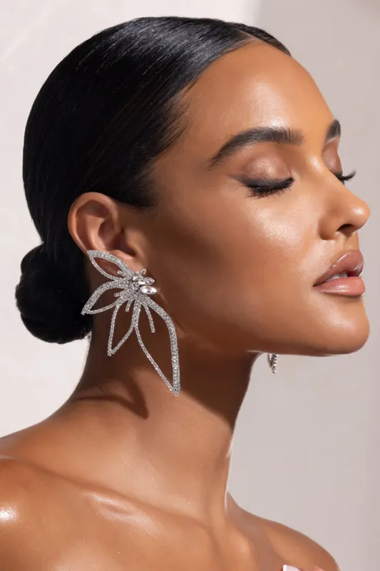 Lorenza | Silver Rhinestone Statement Flower Earrings sold by Club L London