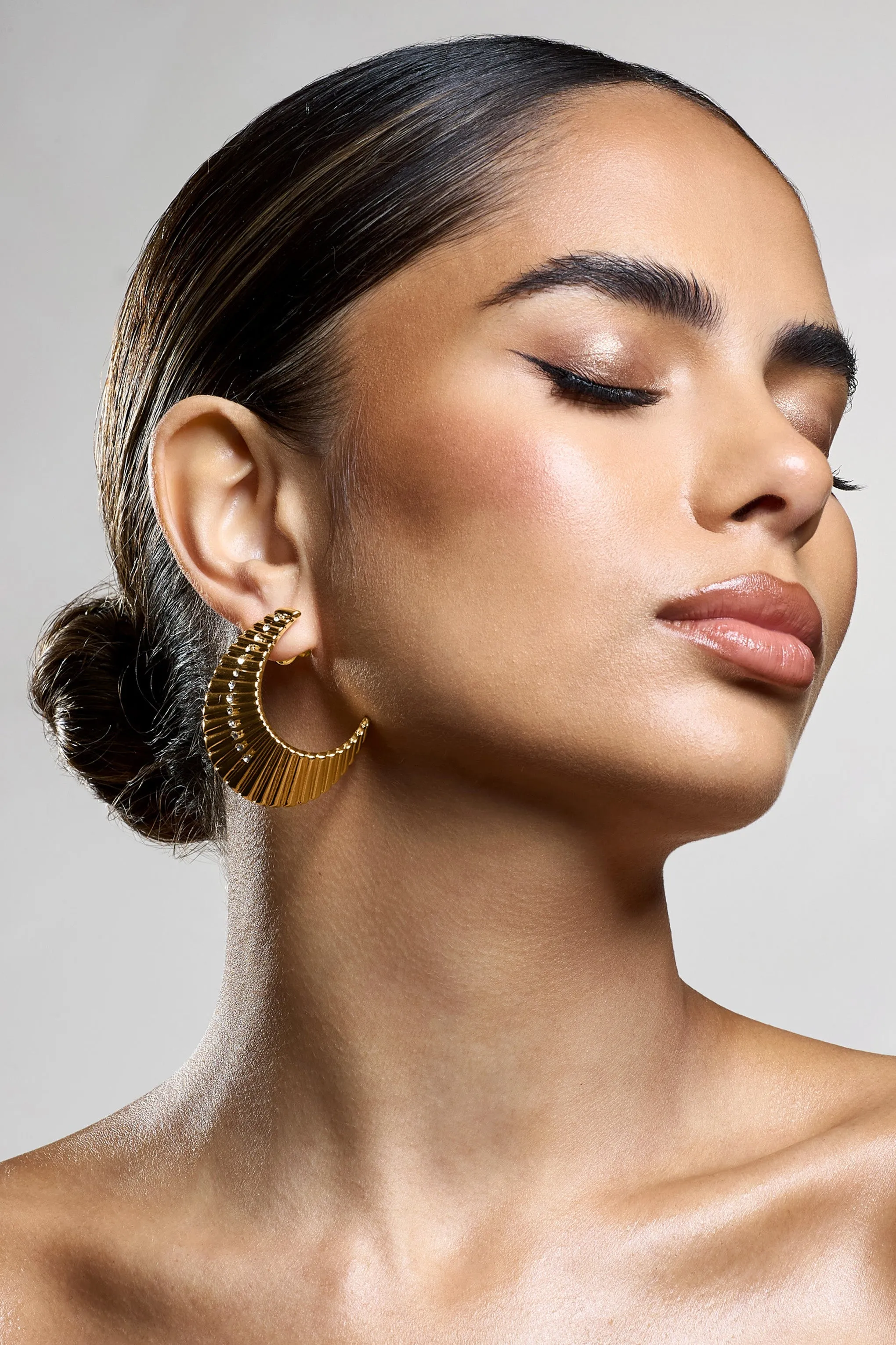 Nura | Gold Diamante Ribbed Statement Earrings sold by Club L London product image thumbnail 4