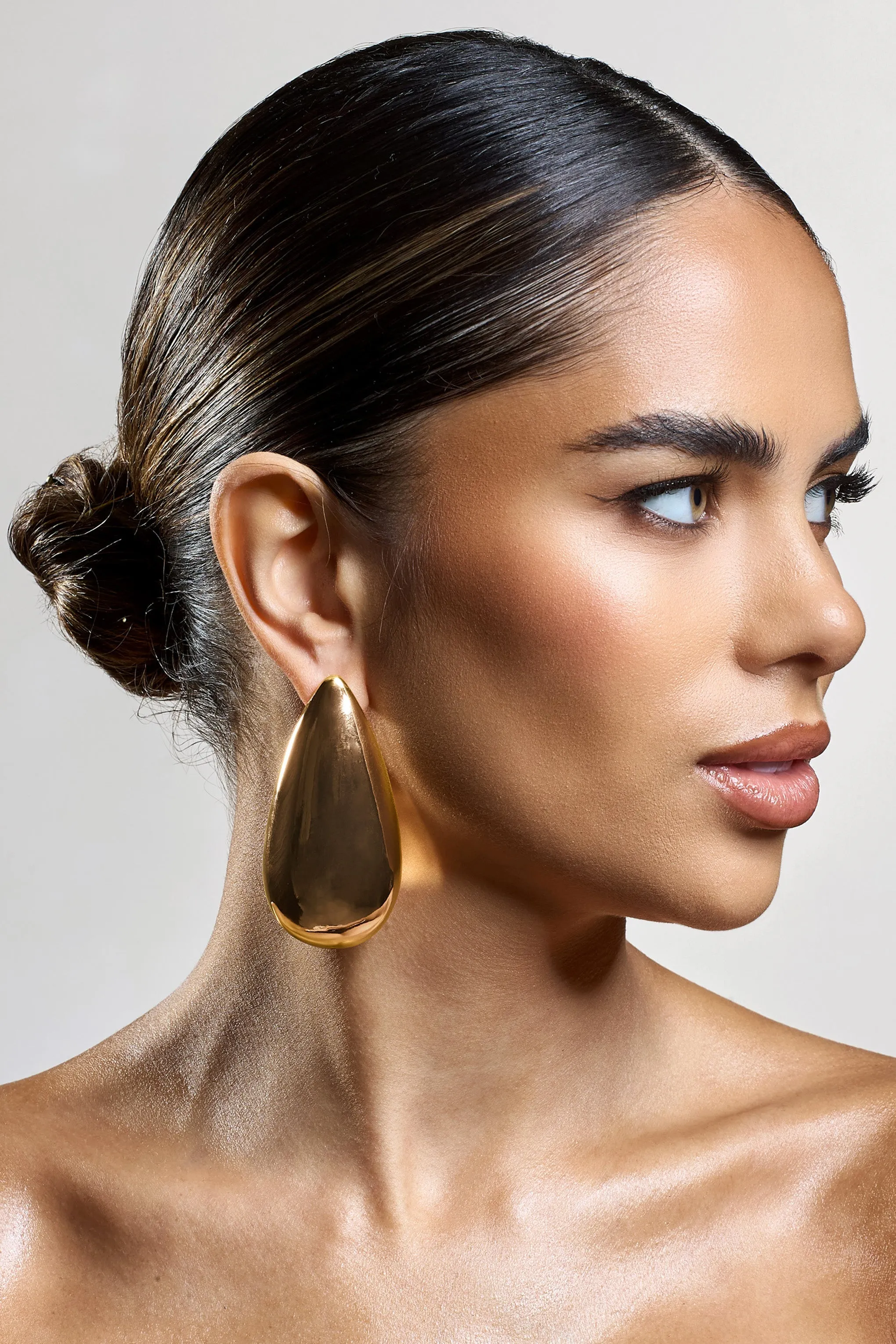 Amiya | Gold Statement Teardrop Earrings sold by Club L London product image thumbnail 3