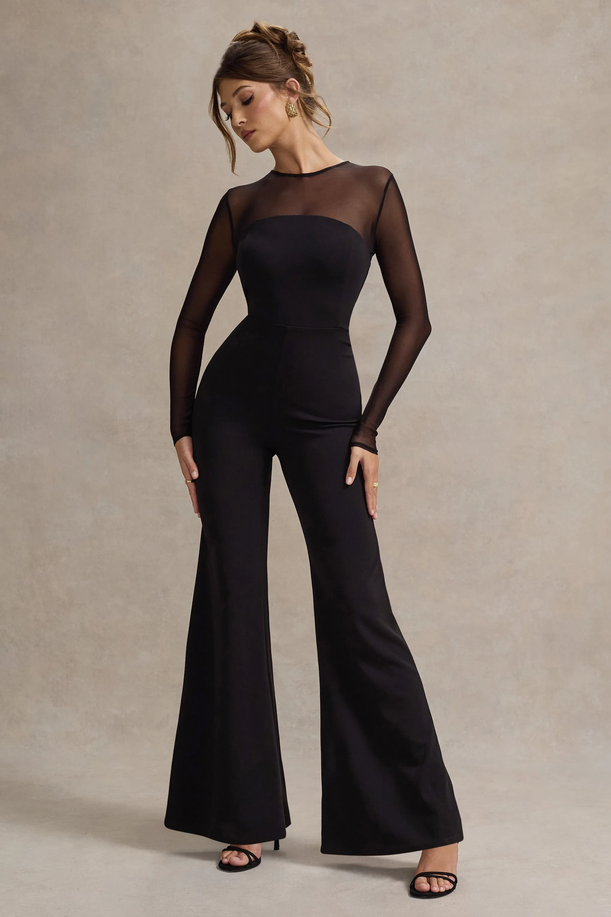 Iggy | Black Flared-Leg Jumpsuit With Mesh Sleeves sold by Club L London