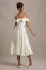 Calliopia | Cream Bow Bardot Midi Dress With Puff-Ball Skirt sold by Club L London