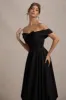 Calliopia | Black Bow Bardot Midi Dress With Puff-Ball Skirt sold by Club L London