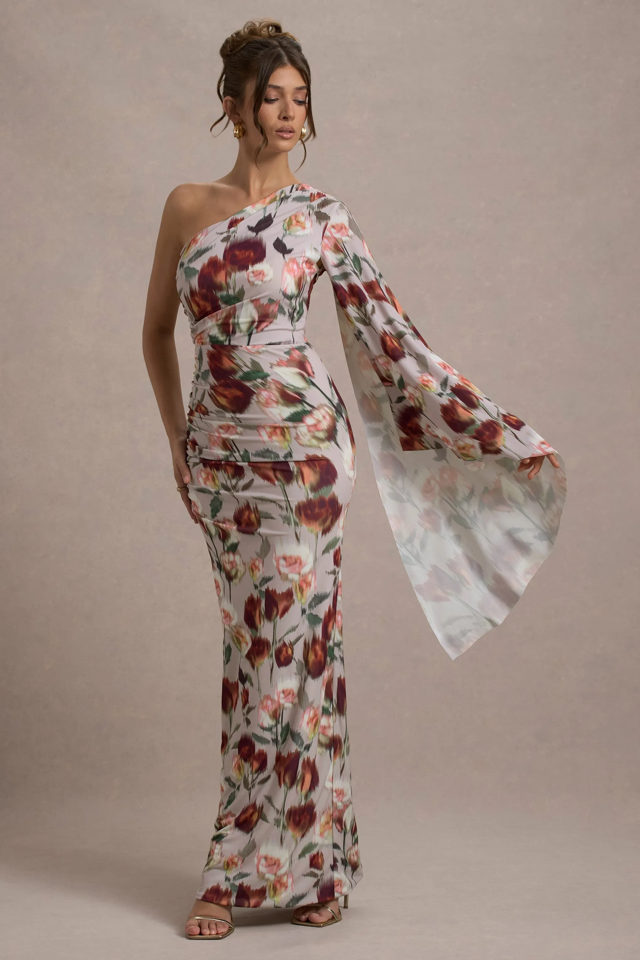 Clementina | Cream Floral Print Asymmetric Cape Sleeve Maxi Dress sold by Club L London