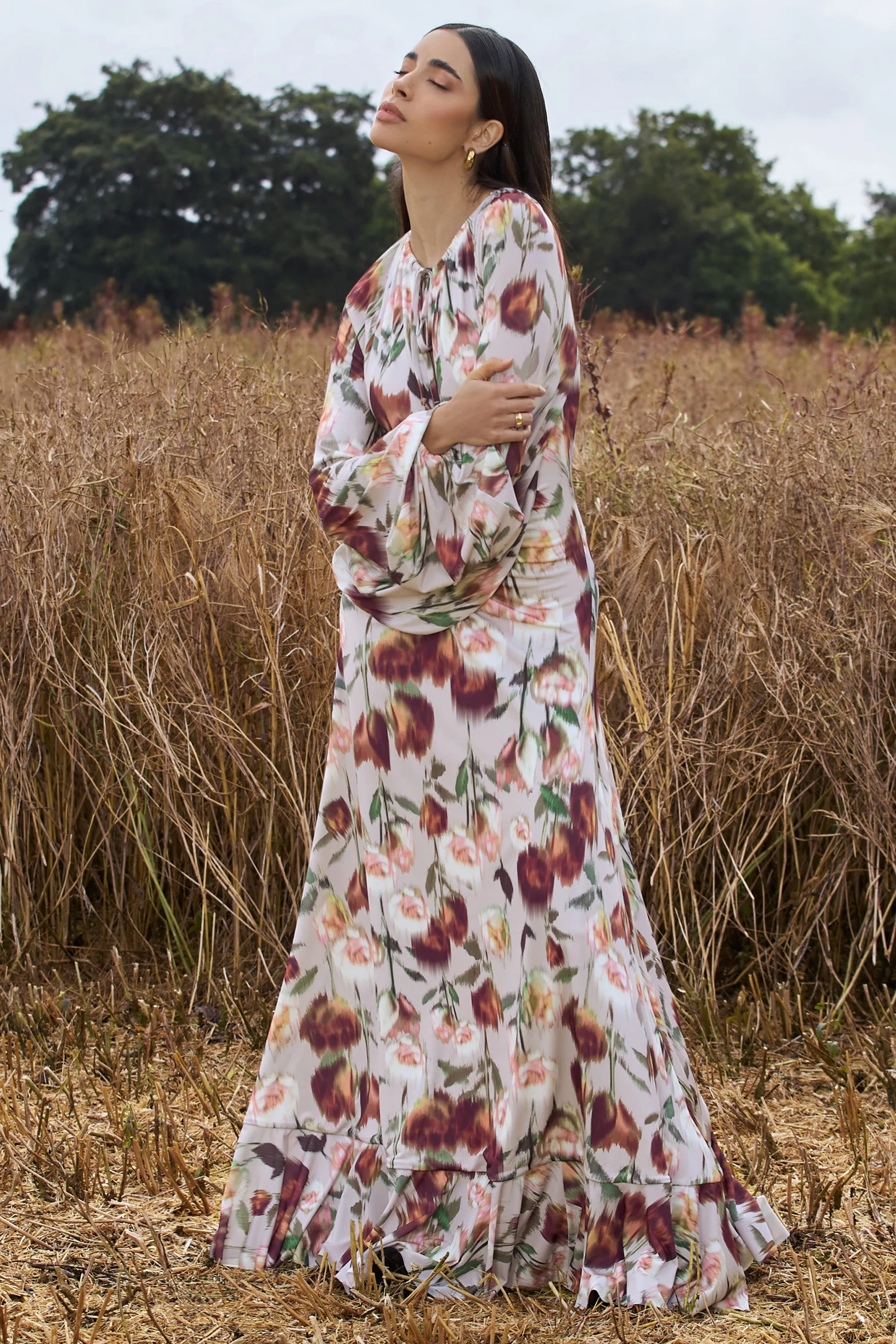 Althena | Cream Floral Print Balloon-Sleeve Maxi Dress sold by Club L London