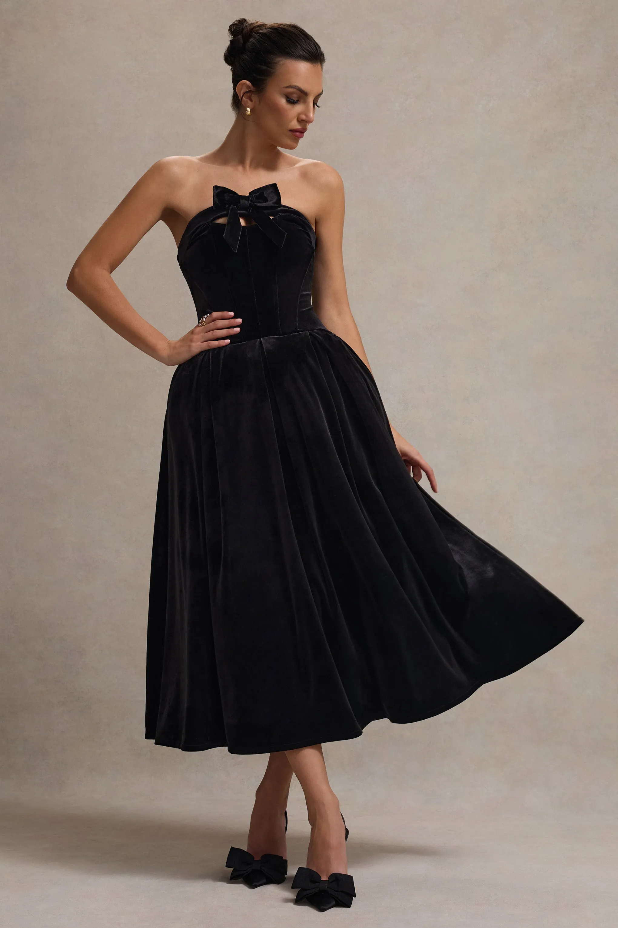Hepburn | Black Velvet Bandeau Midi Dress With Bow sold by Club L London
