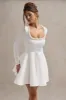 Wilder | White Square-Neck Long-Sleeve Skater Mini Dress sold by Club L London