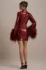 Cupid | Port Sequin High-Neck Mini Dress With Feather Cuffs sold by Club L London