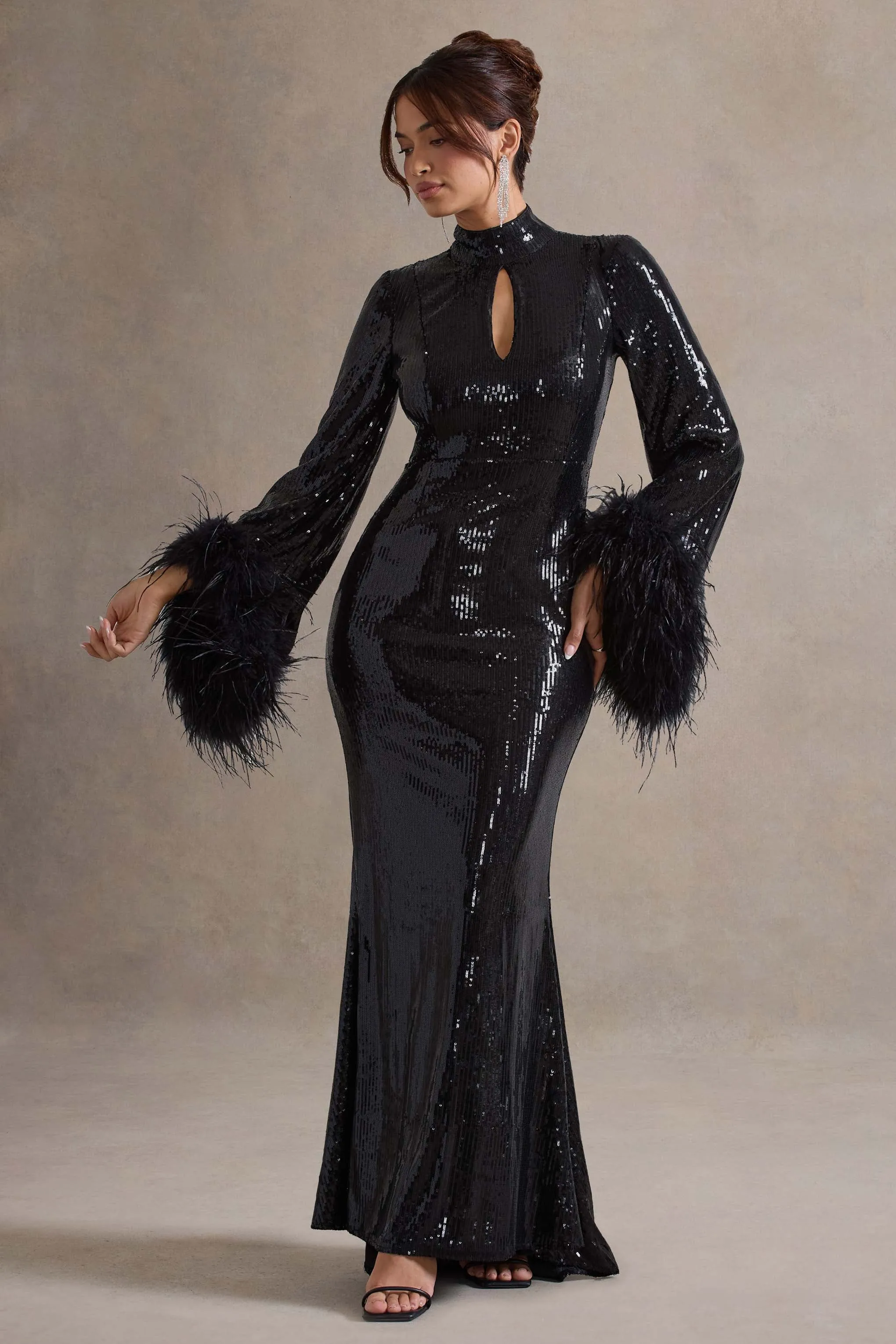 Cosmic Star | Black Sequin High-Neck Maxi Dress With Feather Cuffs sold by Club L London