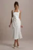 Aman | White Halter-Neck Midi Dress With Oversized Bow sold by Club L London