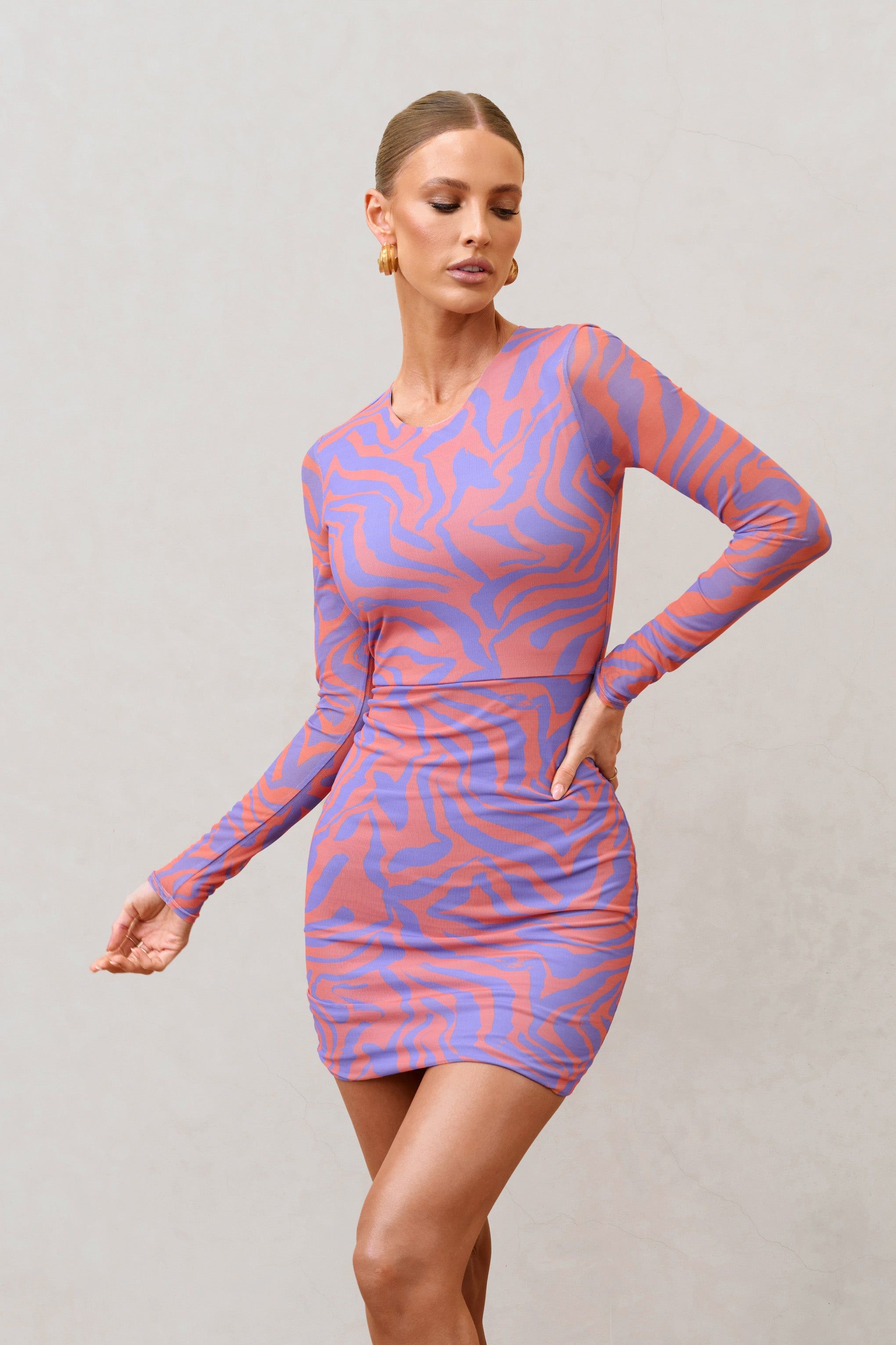 Night Sky | Orange Zebra Print Mesh Long Sleeves Mini Dress sold by Club L London product image thumbnail 4