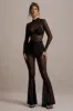 Romelle | Black Mesh Flared-Leg Trousers sold by Club L London
