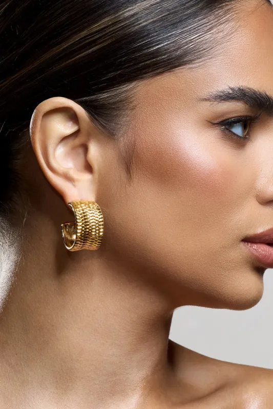 Corda | Gold Textured Chunky Hoop Earrings sold by Club L London