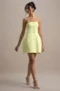 Anniston | Lemon Bandeau Tailored Button Mini Dress sold by Club L London