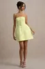 Anniston | Lemon Bandeau Tailored Button Mini Dress sold by Club L London