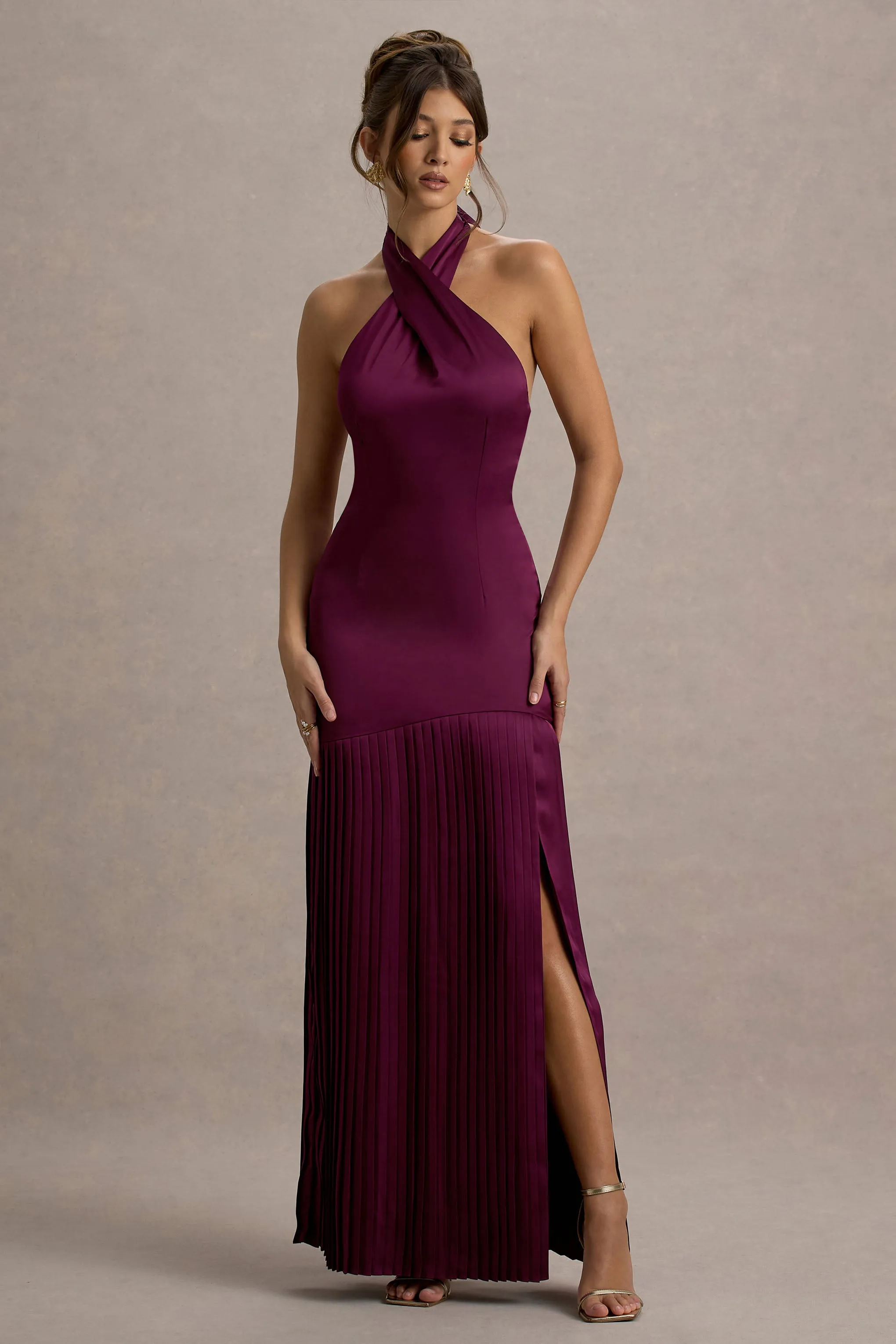 Sansa | Burgundy Satin Cross Halter-Neck Plisse Maxi Dress sold by Club L London