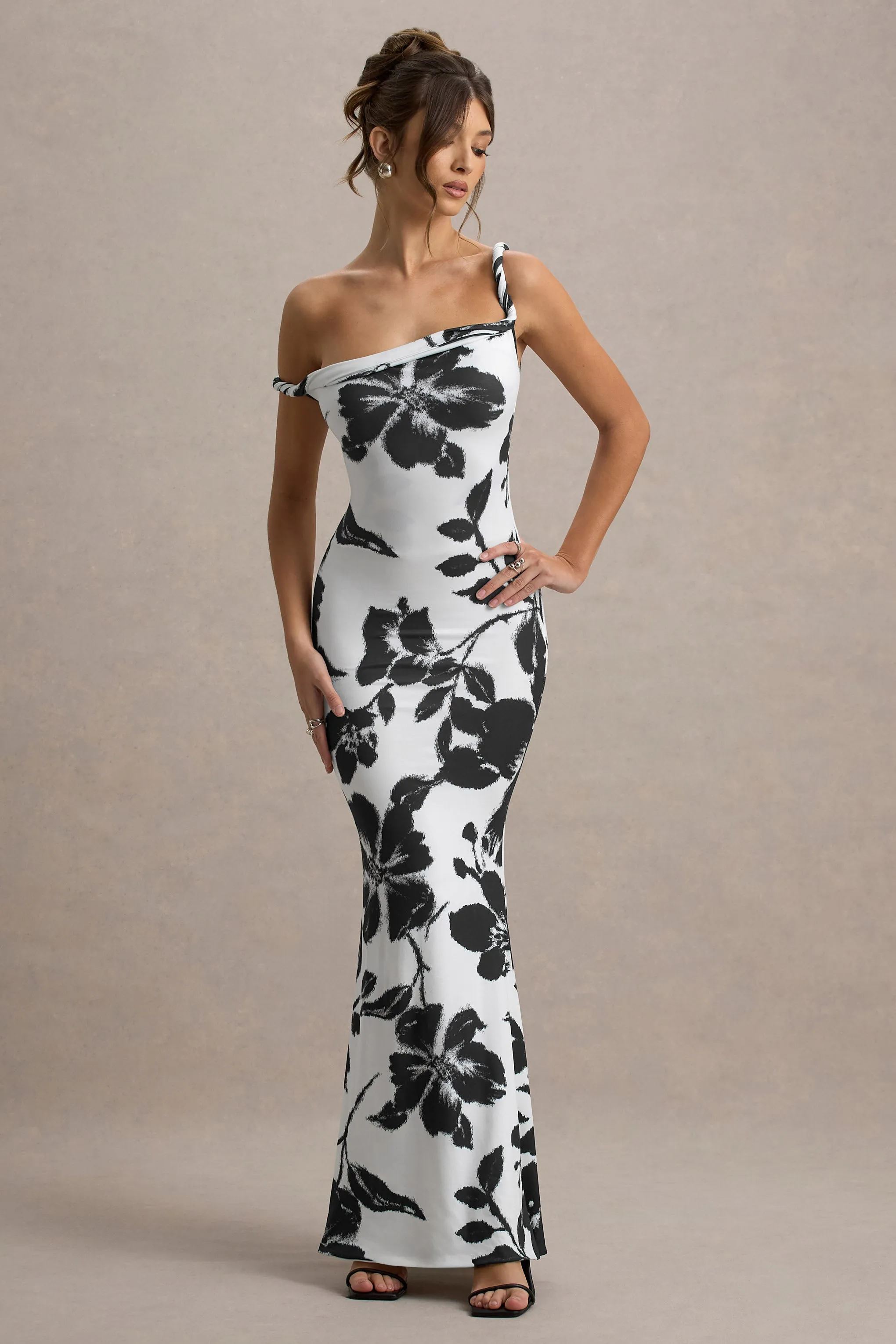 Lita | Monochrome Floral Print Twisted Asymmetric Maxi Dress sold by Club L London