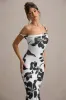 Lita | Monochrome Floral Print Twisted Asymmetric Maxi Dress sold by Club L London