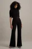 Isoline | Black Twist Cape Flared-Leg Jumpsuit sold by Club L London