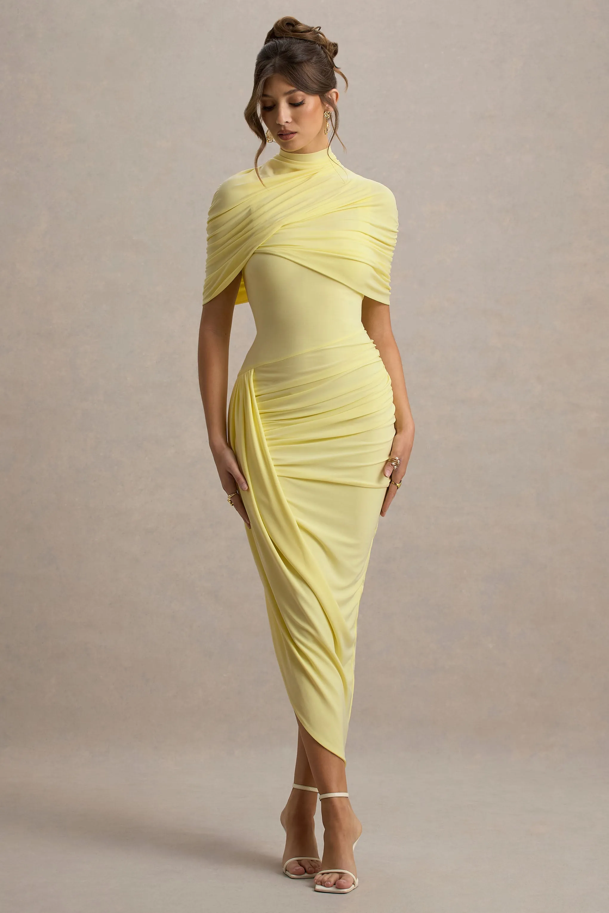 Enchant | Lemon Asymmetric Twisted Cape Maxi Dress sold by Club L London