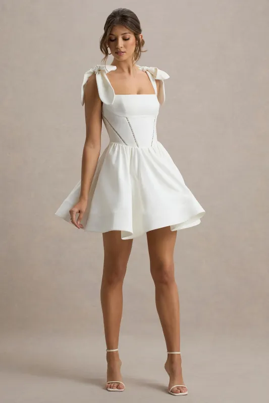 Mochi | White Skater Mini Dress With Bow Straps sold by Club L London