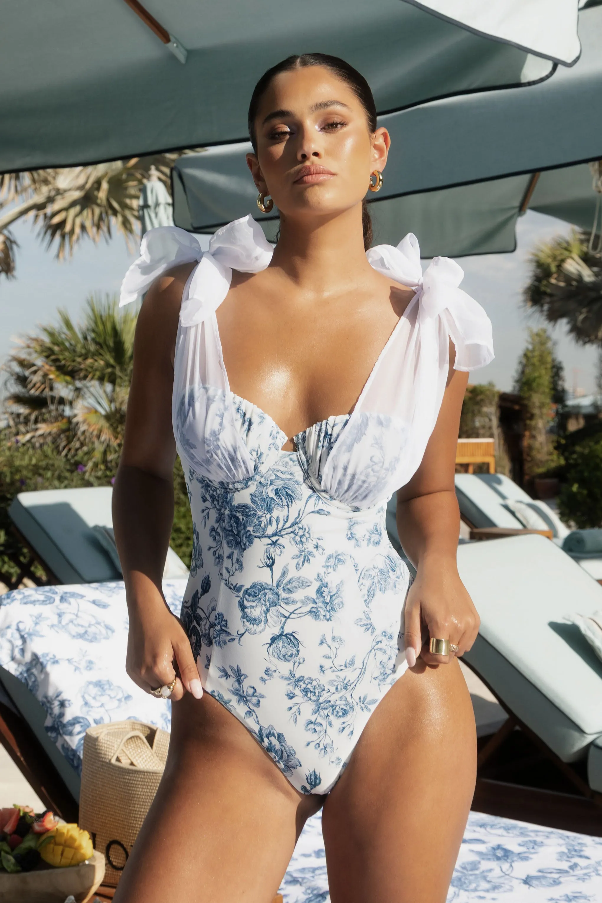 Sheer Bliss | Blue Porcelain Print Swimsuit With Organza Bows sold by Club L London