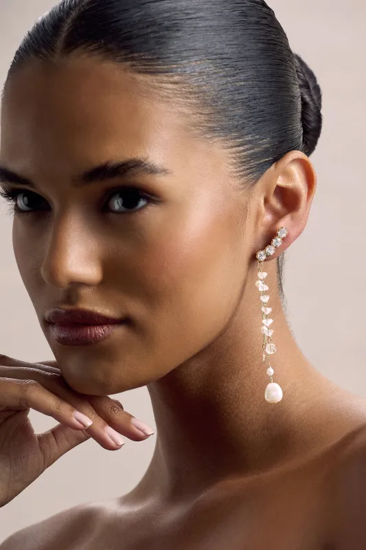 In the Stars | Gold Diamante Pearl Star Tassel Earrings sold by Club L London