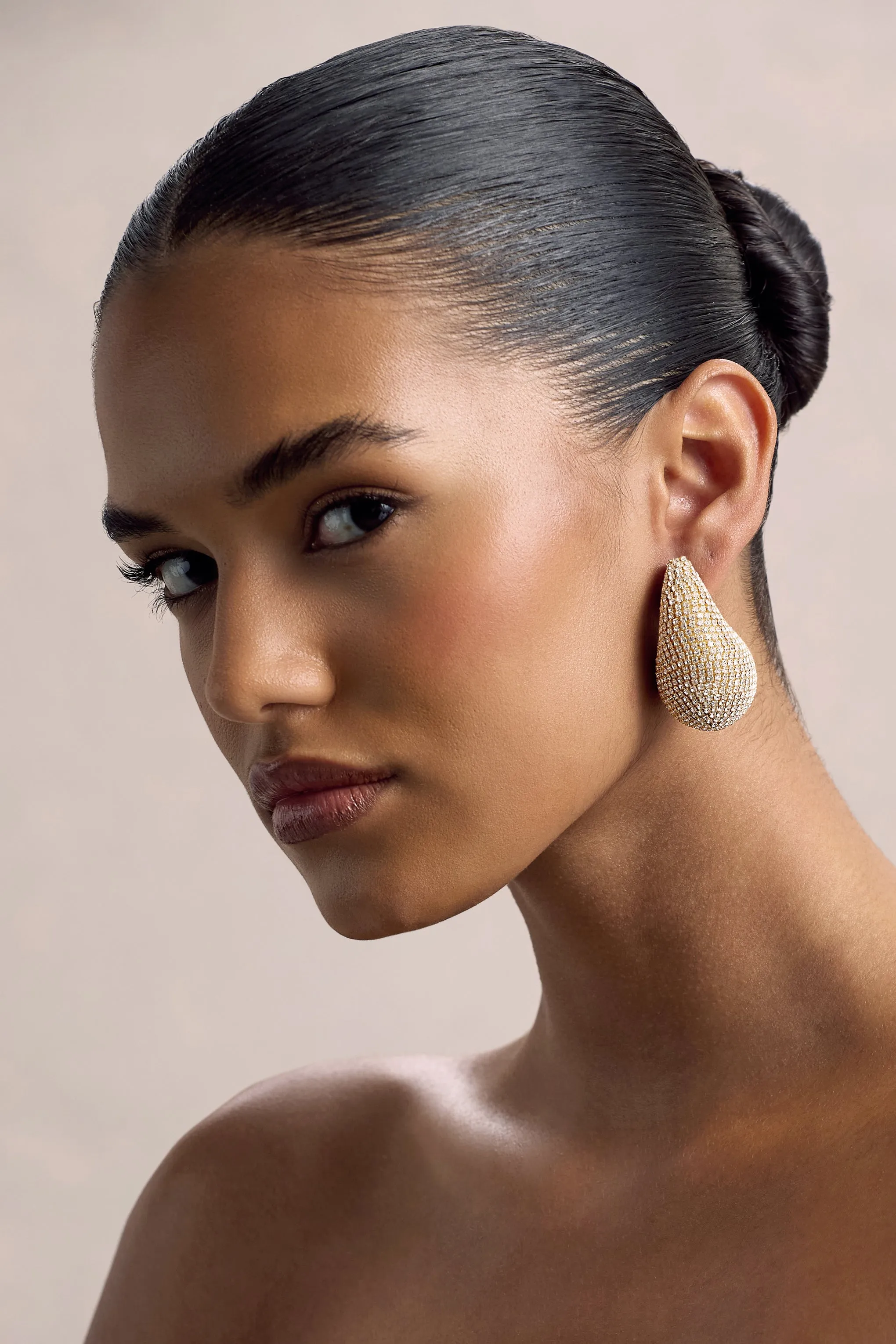 True Icon | Gold Diamante Statement Teardrop Earrings sold by Club L London product image thumbnail 3
