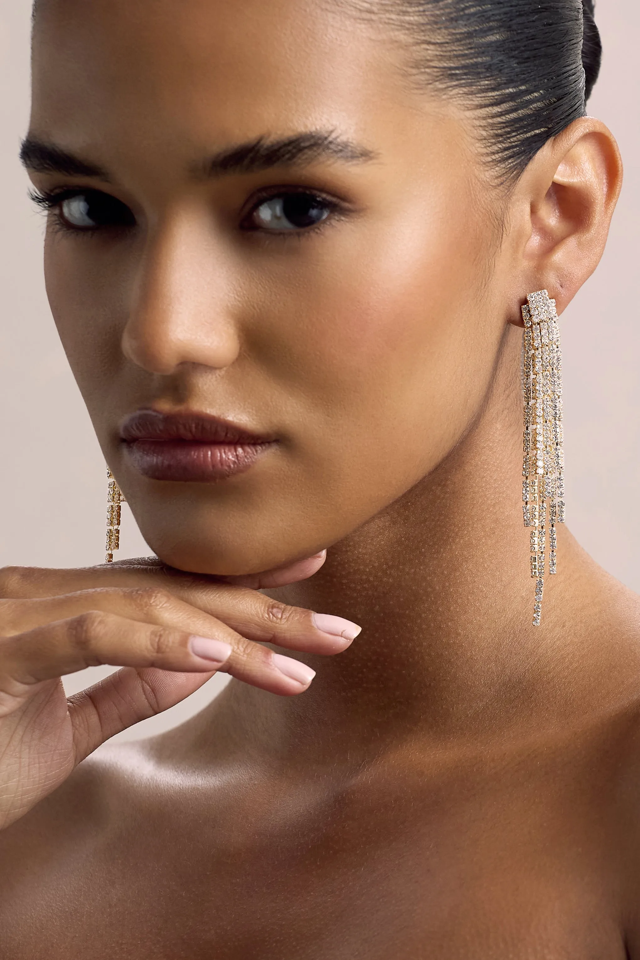 Abeam | Gold Diamante Tassel Earrings sold by Club L London