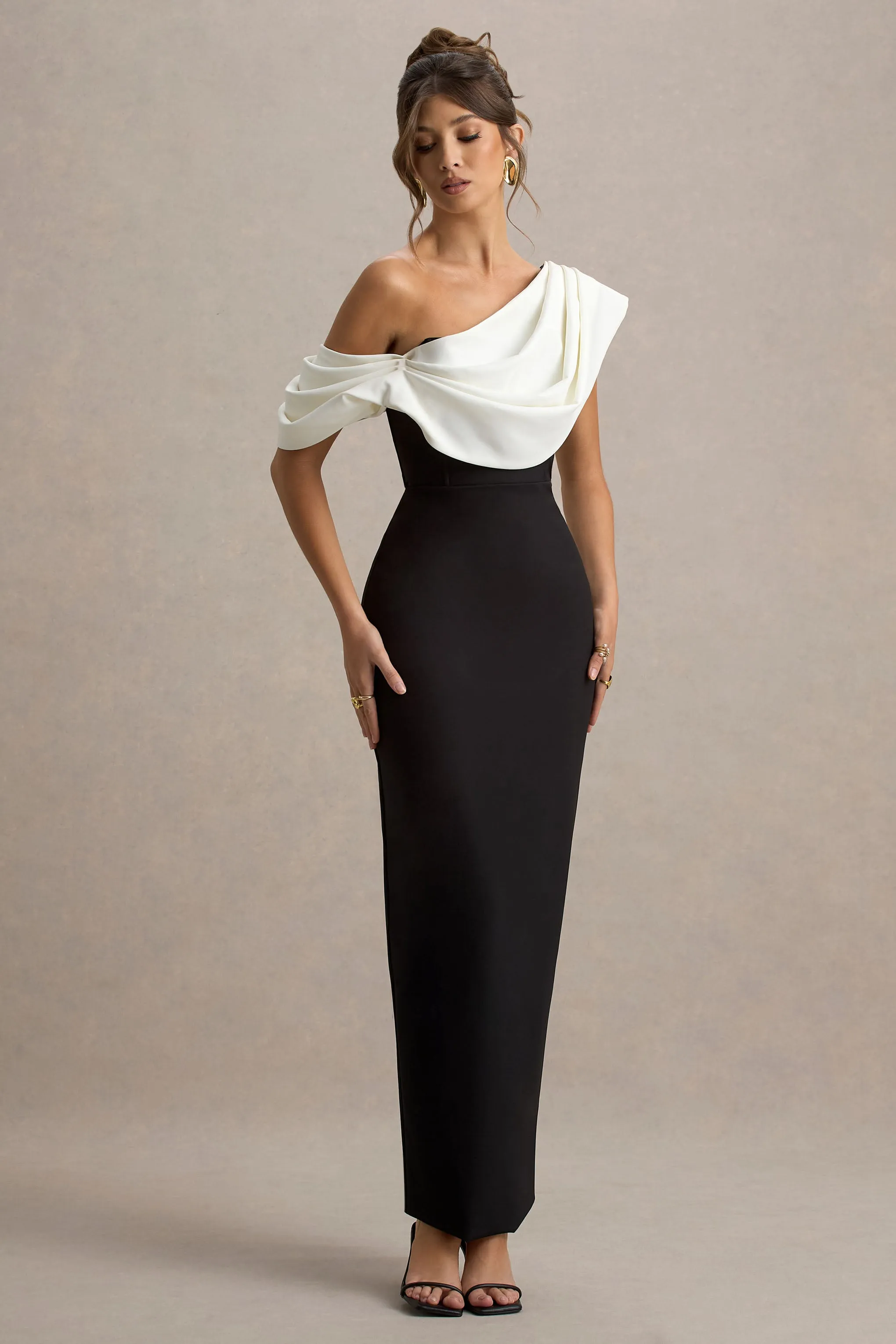 Angelina | Black & White Draped Shoulder Maxi Dress sold by Club L London
