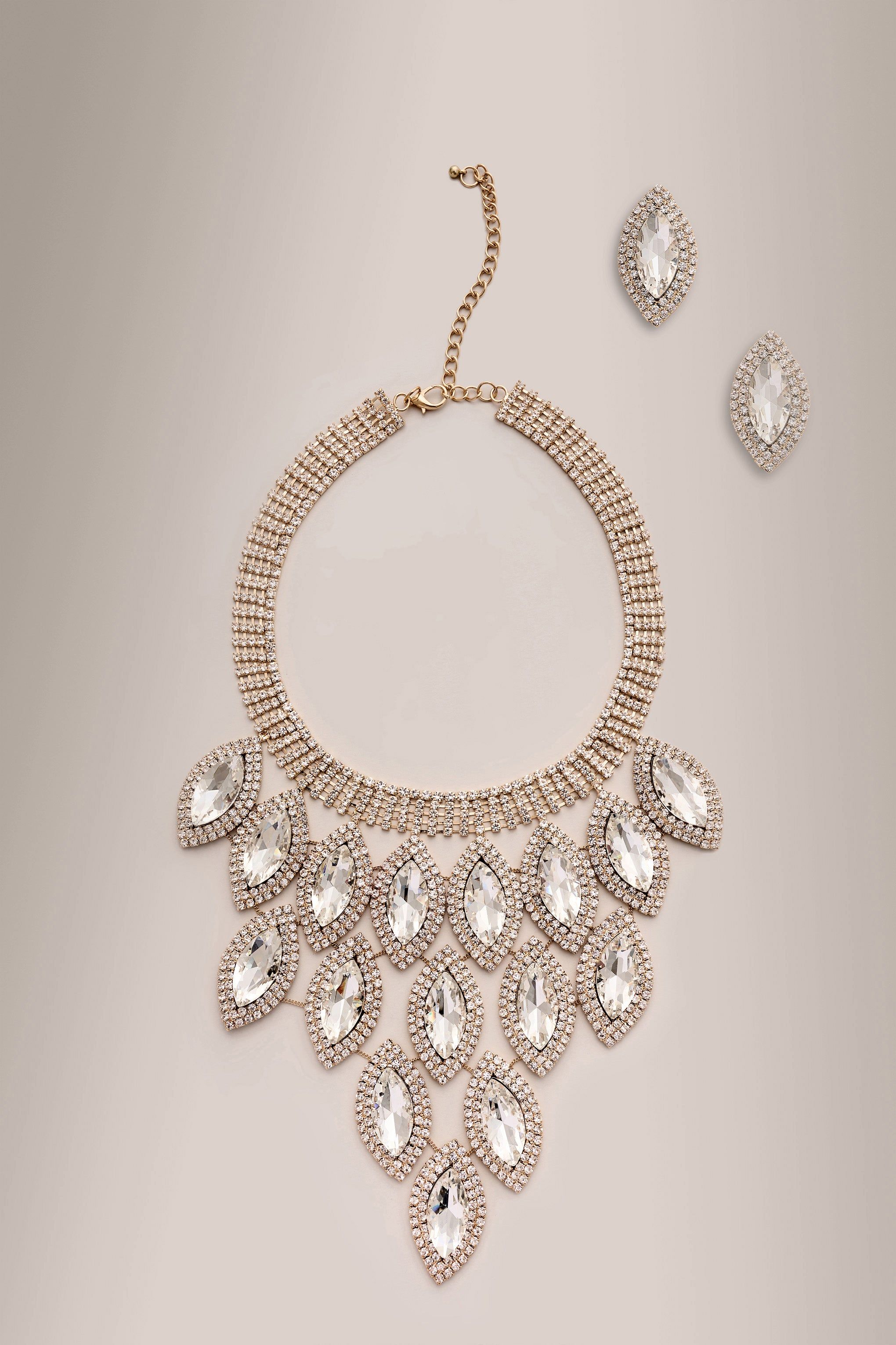 Alberta | Gold Statement Jewelled Necklace and Earrings sold by Club L London