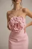 Phina | Pale Pink Bodycon Midi Dress With Large Floral Corsages sold by Club L London