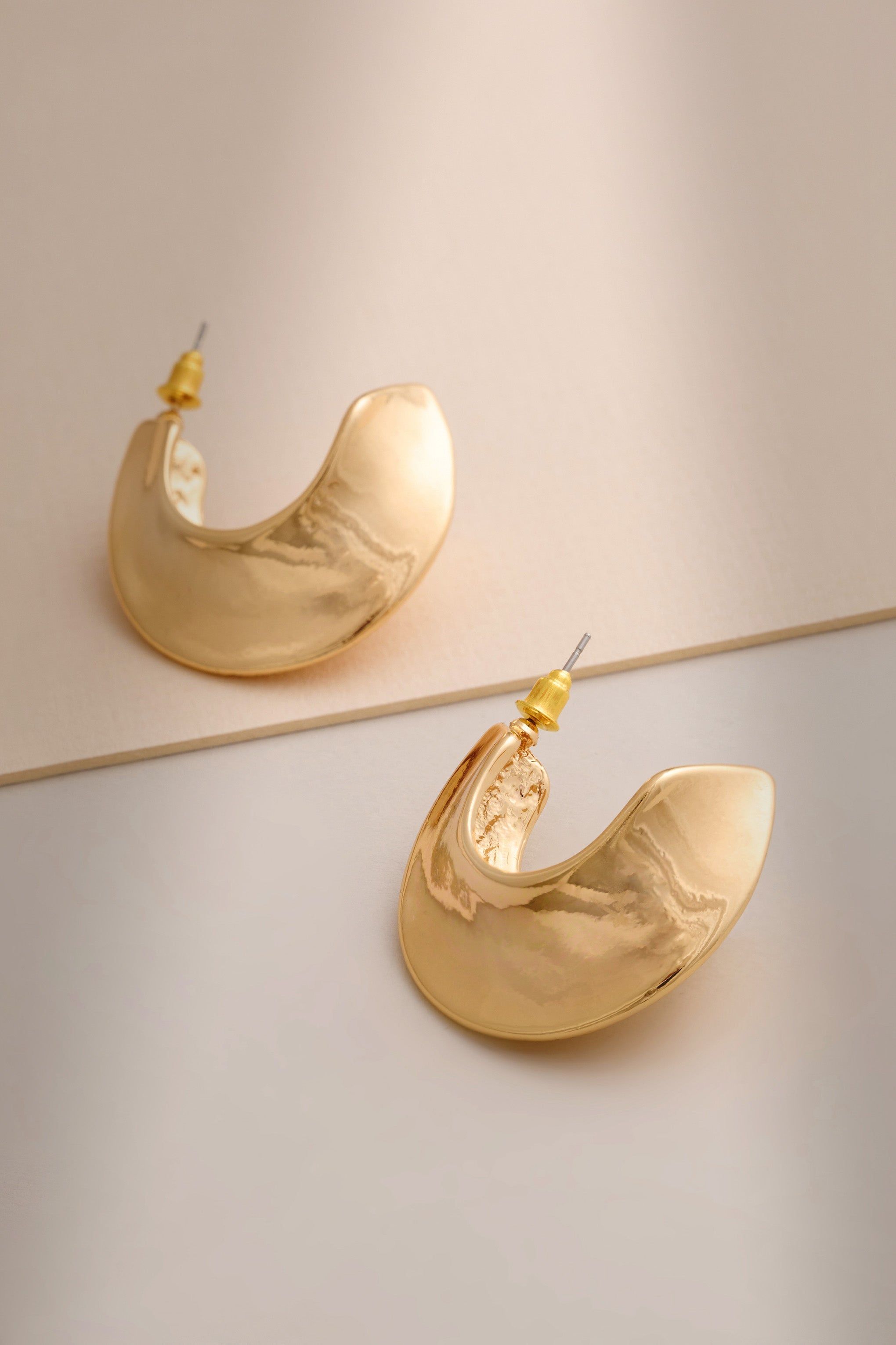 Malta | Gold Chunky Hoop Earrings sold by Club L London