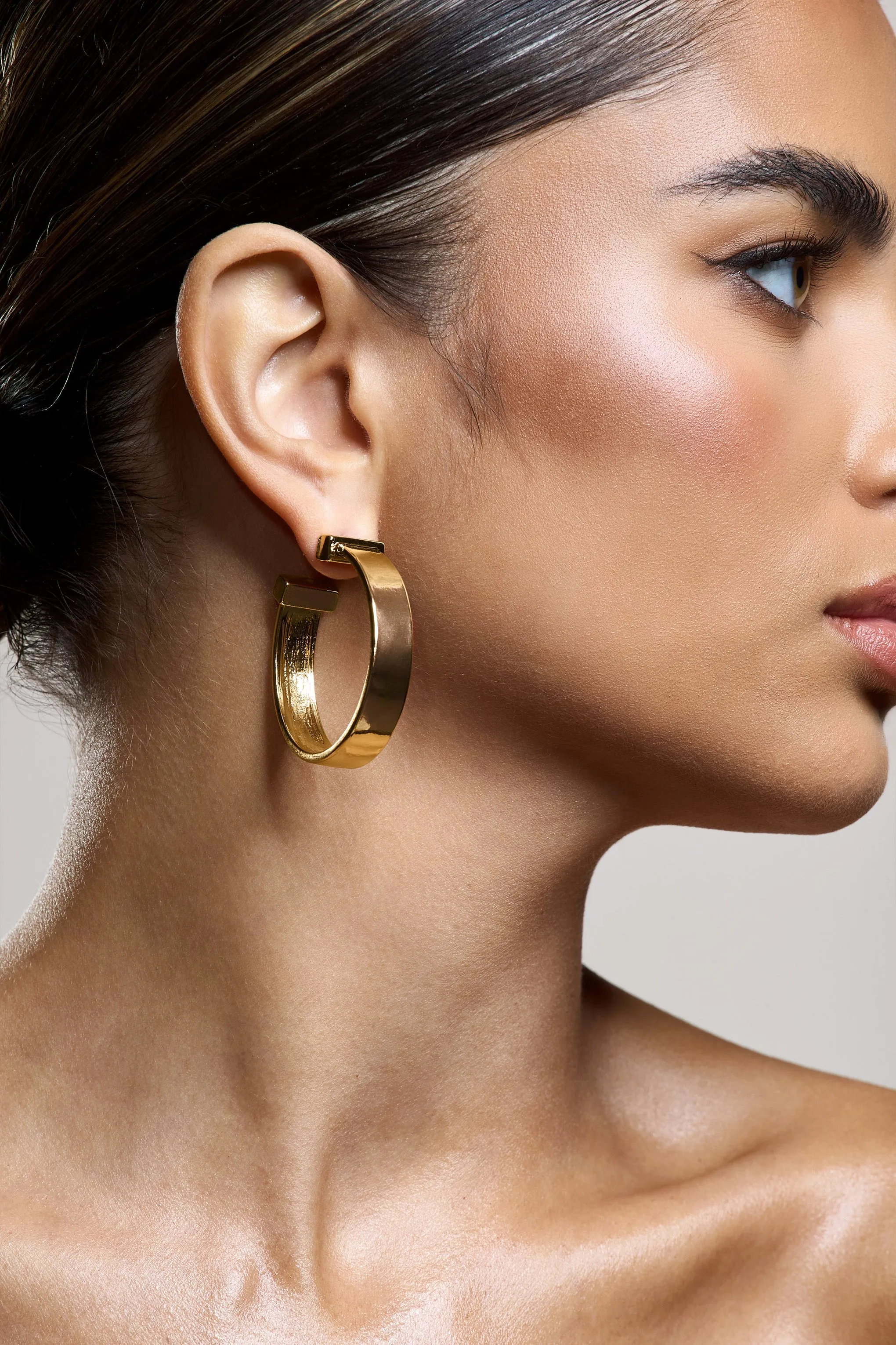 Amery | Gold Chunky Hoop Earrings sold by Club L London product image thumbnail 4