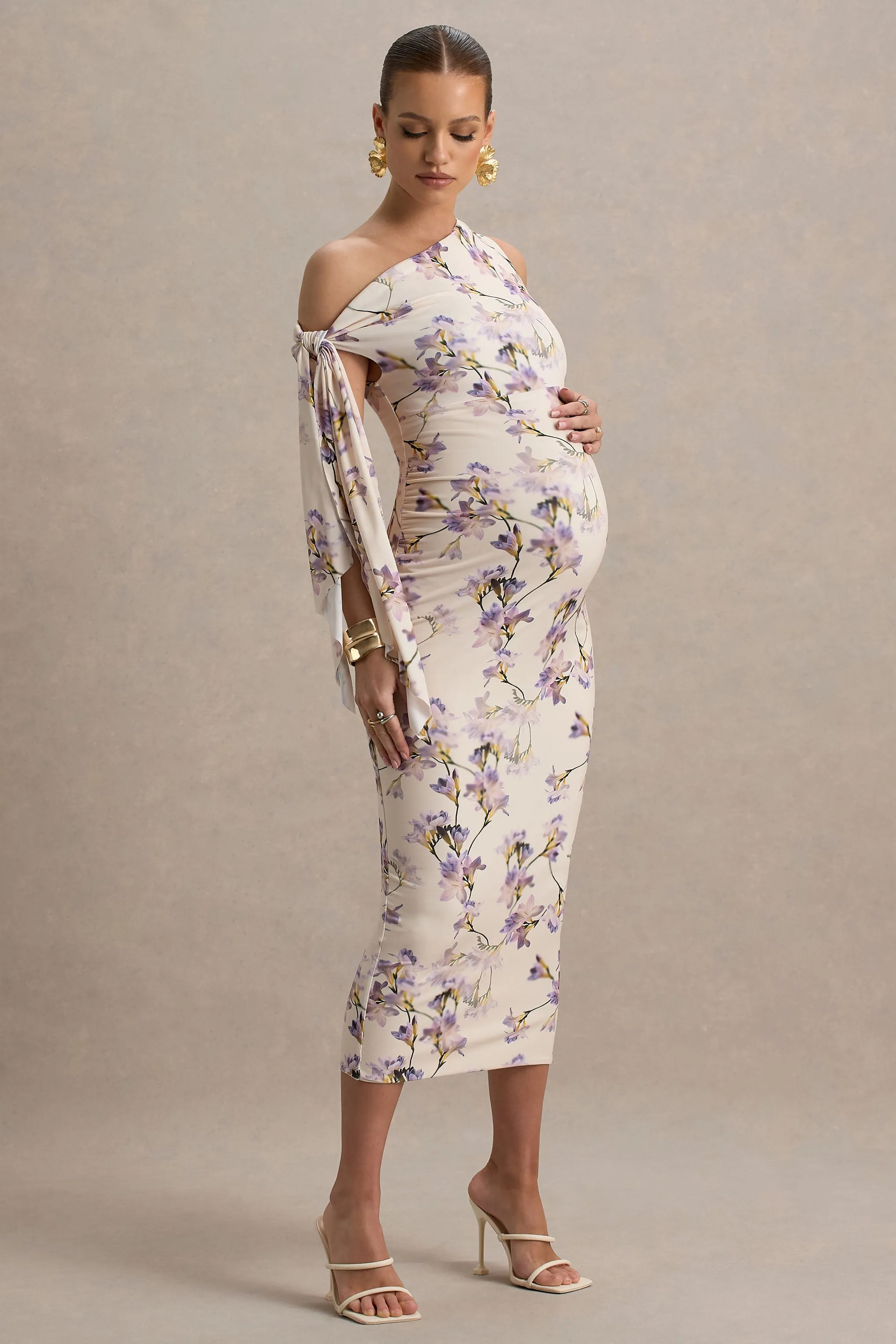 Katarine | Peach Floral Print Asymmetric Knot Maternity Midi Dress sold by Club L London