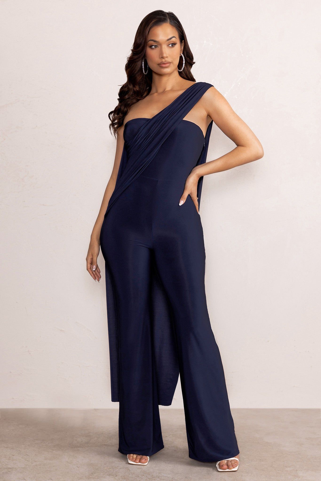 Kendra | Navy Asymmetric Bandeau Jumpsuit with Drape sold by Club L London