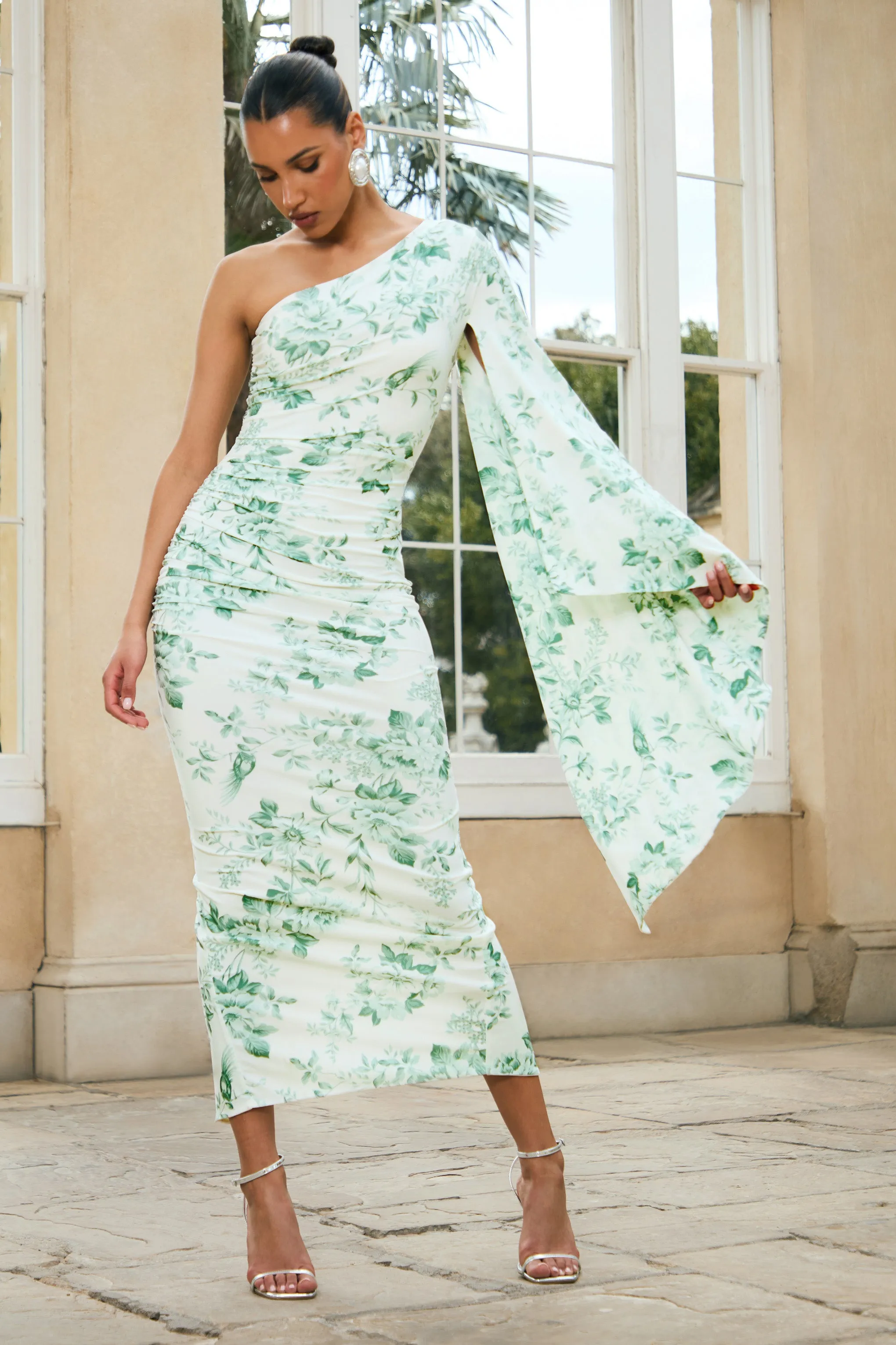 Clementina | Green Floral Print Asymmetric Cape Sleeve Maxi Dress sold by Club L London