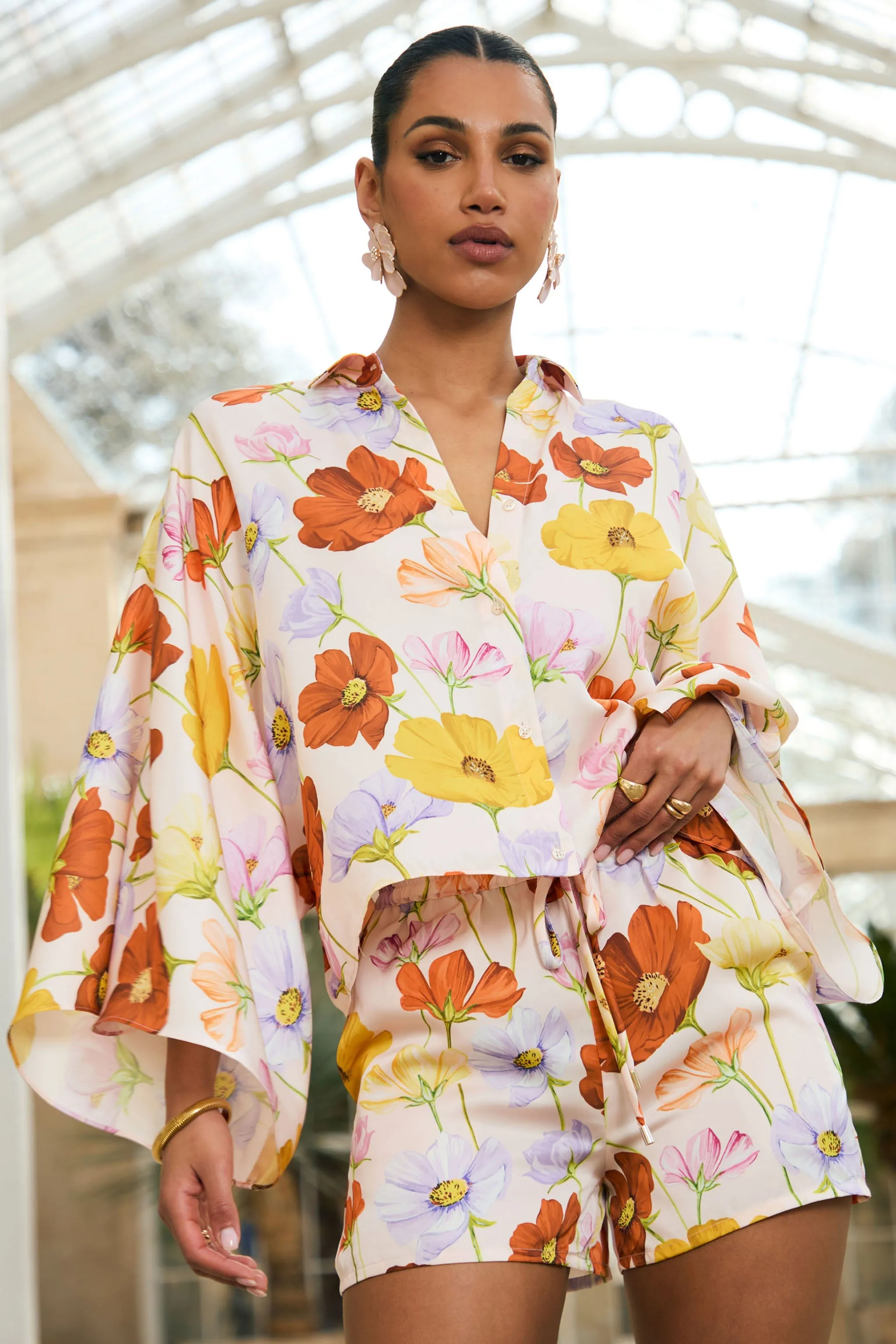 Sovran | Bright Floral Print Shorts sold by Club L London