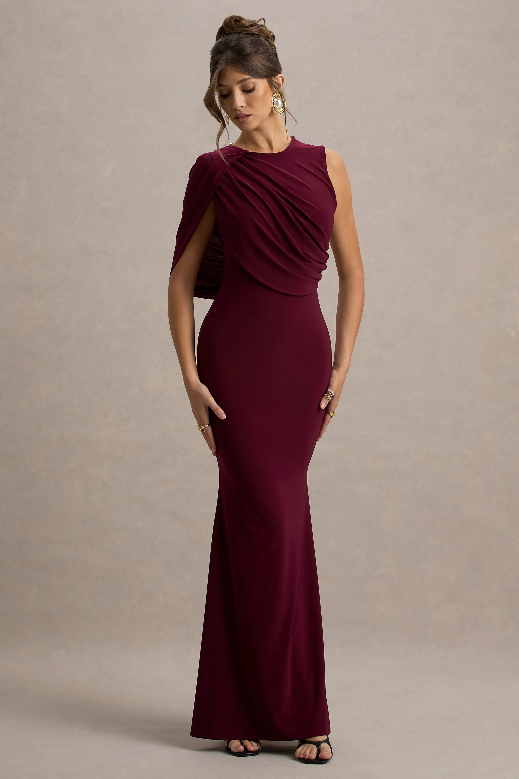 Rae | Burgundy Maxi Dress With One-Sleeve Cape sold by Club L London