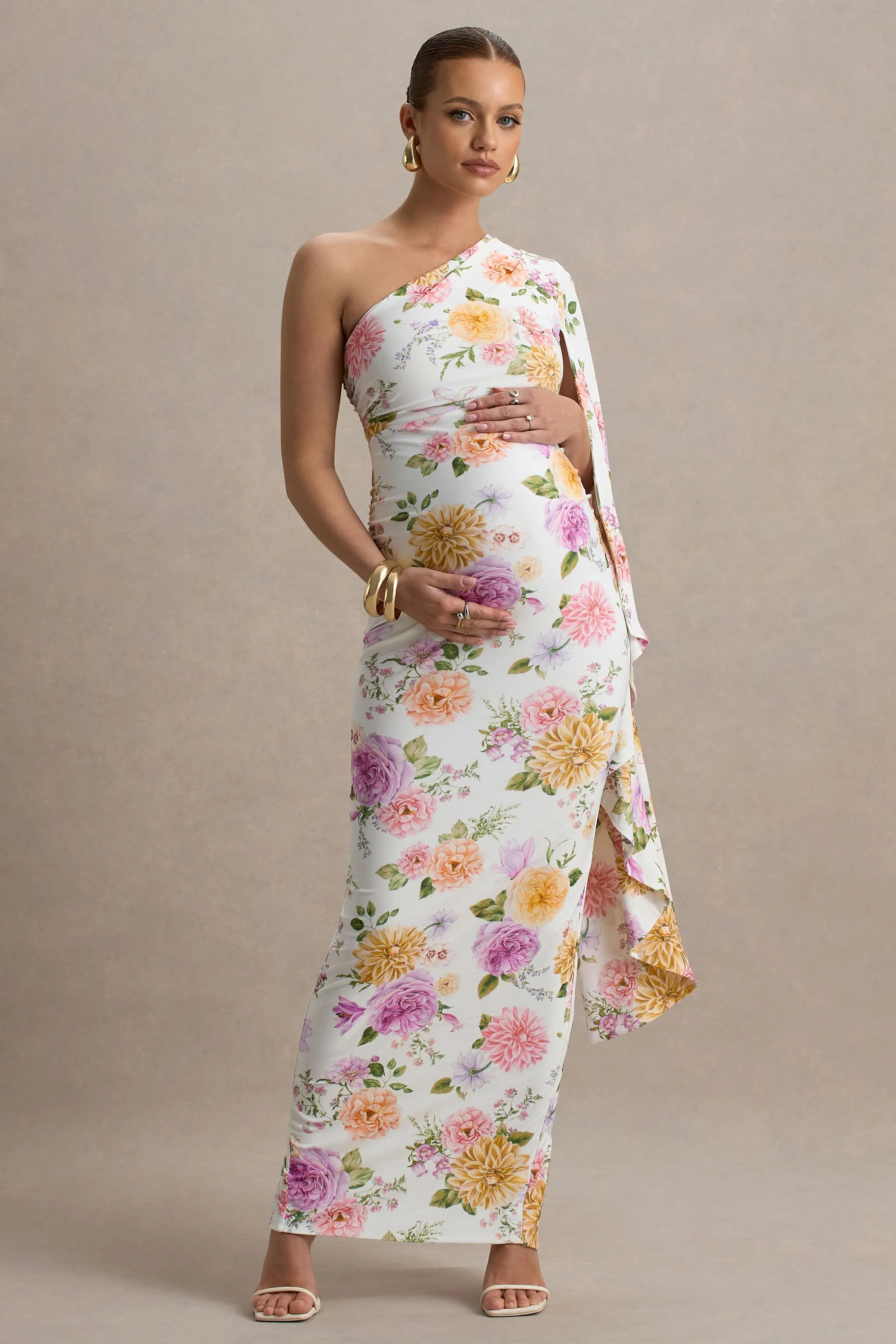 Aliana | Peach And Lilac Floral Print Asymmetric Maternity Maxi Dress With Ruched Detailing sold by Club L London