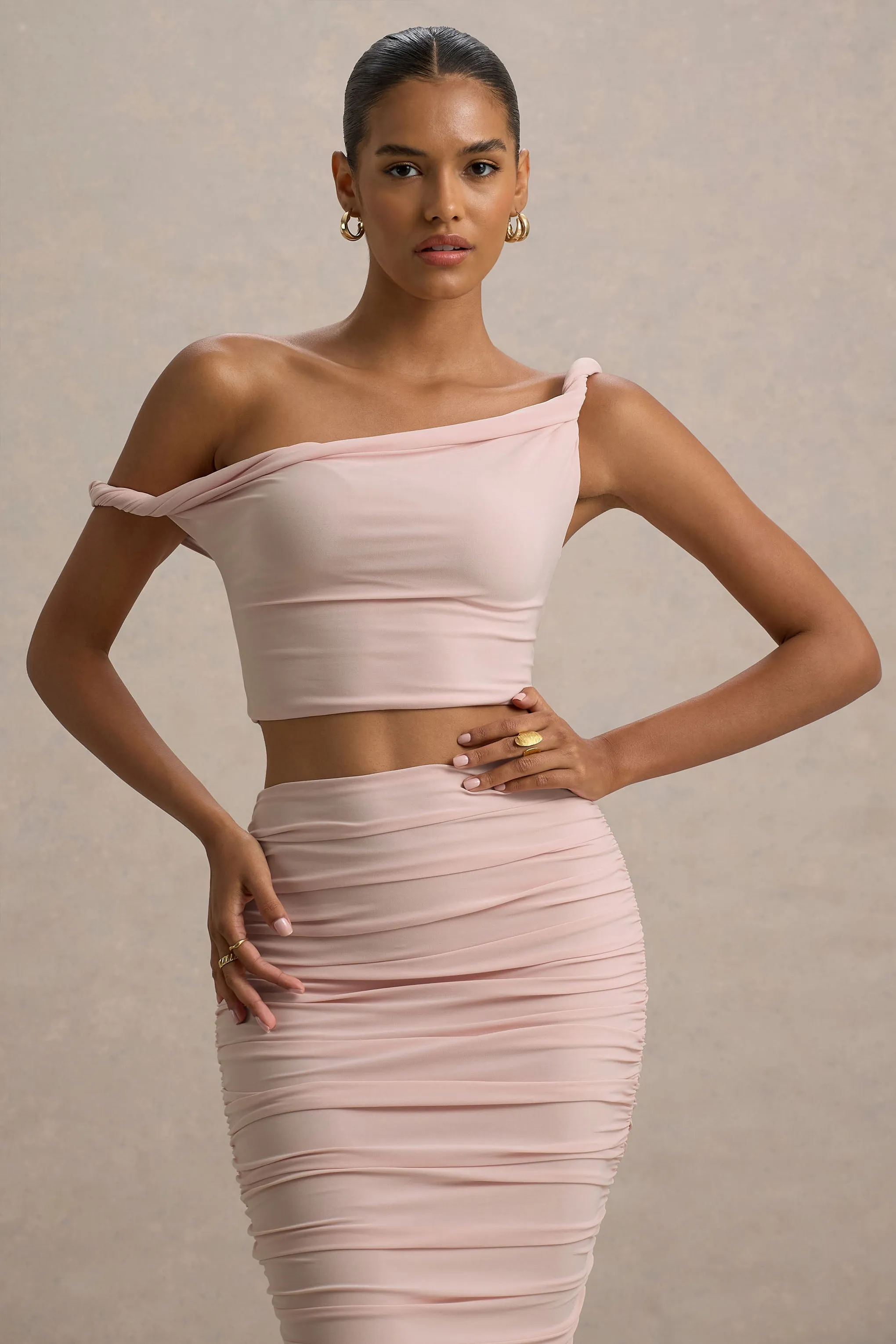 Ariel | Light Pink Twisted Asymmetric Crop Top sold by Club L London