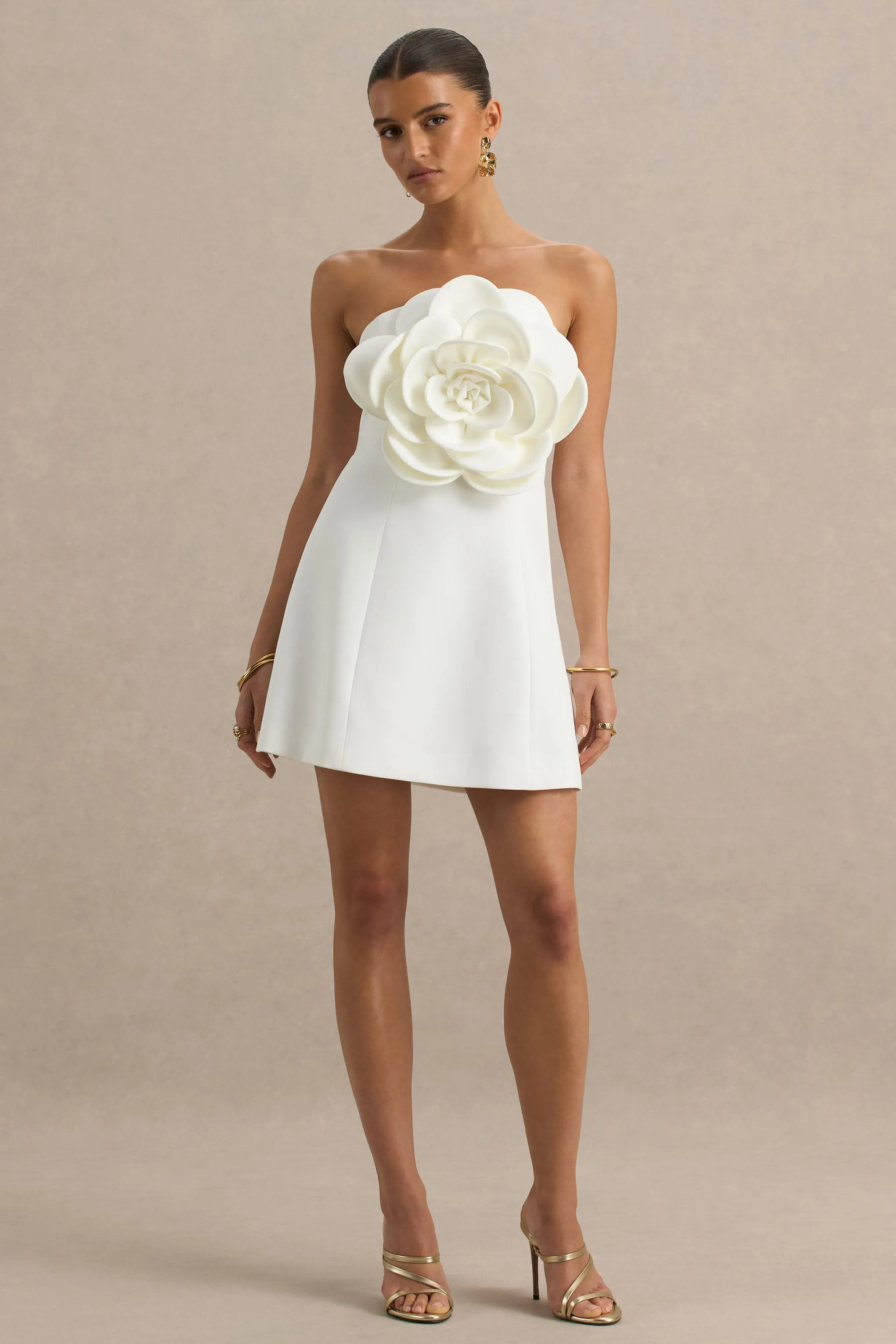 Daffodil | White Bandeau Mini Dress With Large Floral Corsage sold by Club L London