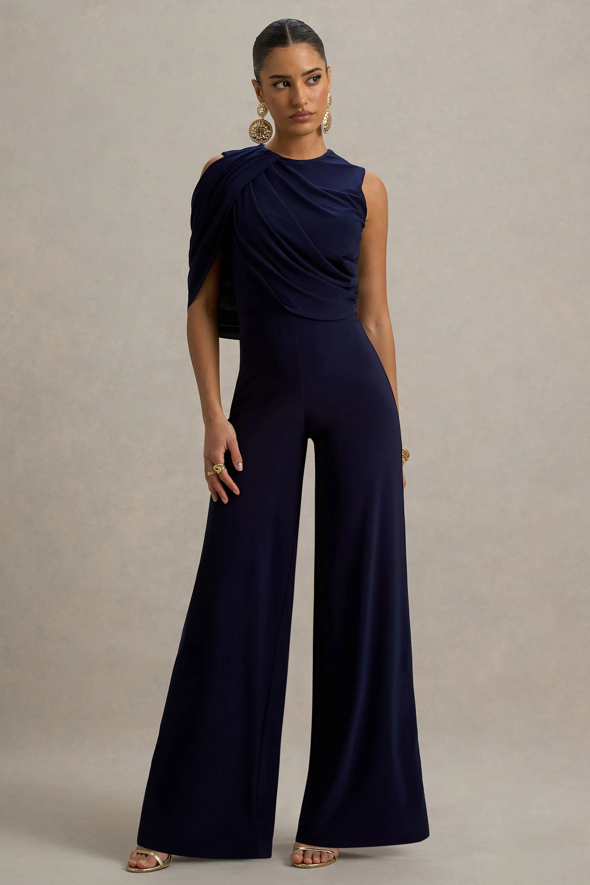 Opulence | Navy Jumpsuit With Cape Sleeve and Draped Details sold by Club L London