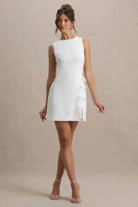 Kalina | White Mini Dress With Bow Detail sold by Club L London