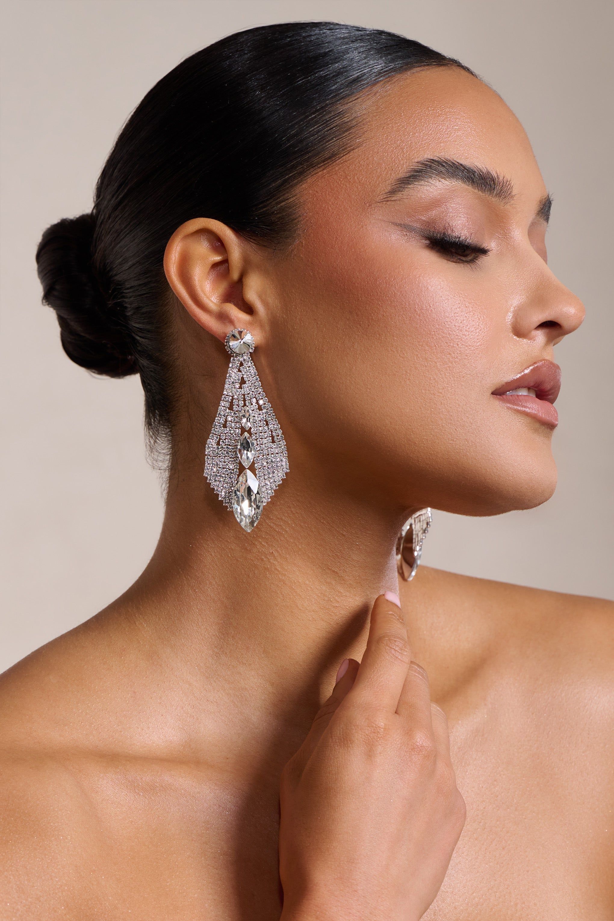 Delaney | Silver Diamante Teardrop Earrings sold by Club L London