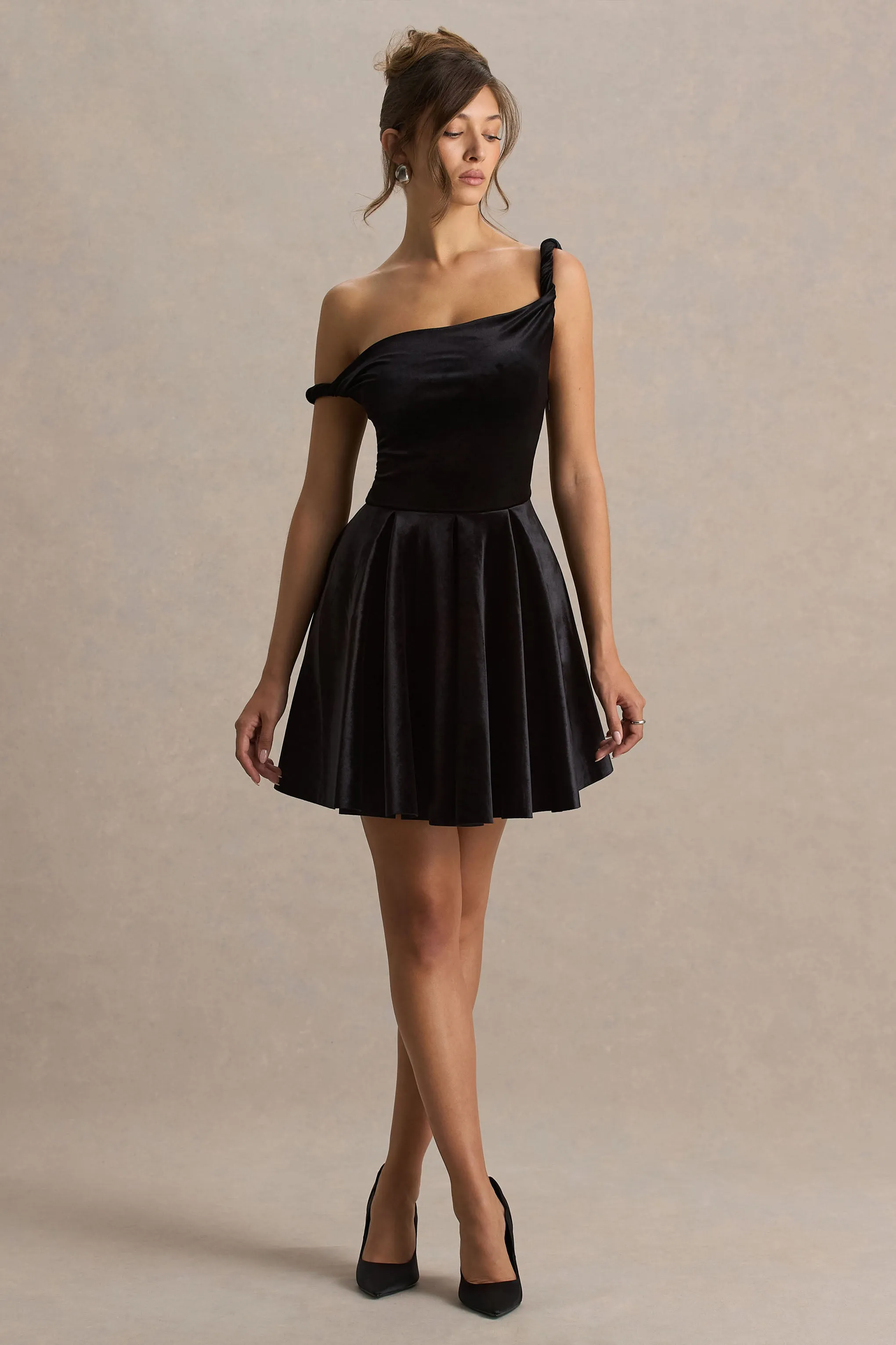 Leticia | Black Velvet Asymmetric-Neck Velvet Mini Dress With Twist-Sleeve sold by Club L London