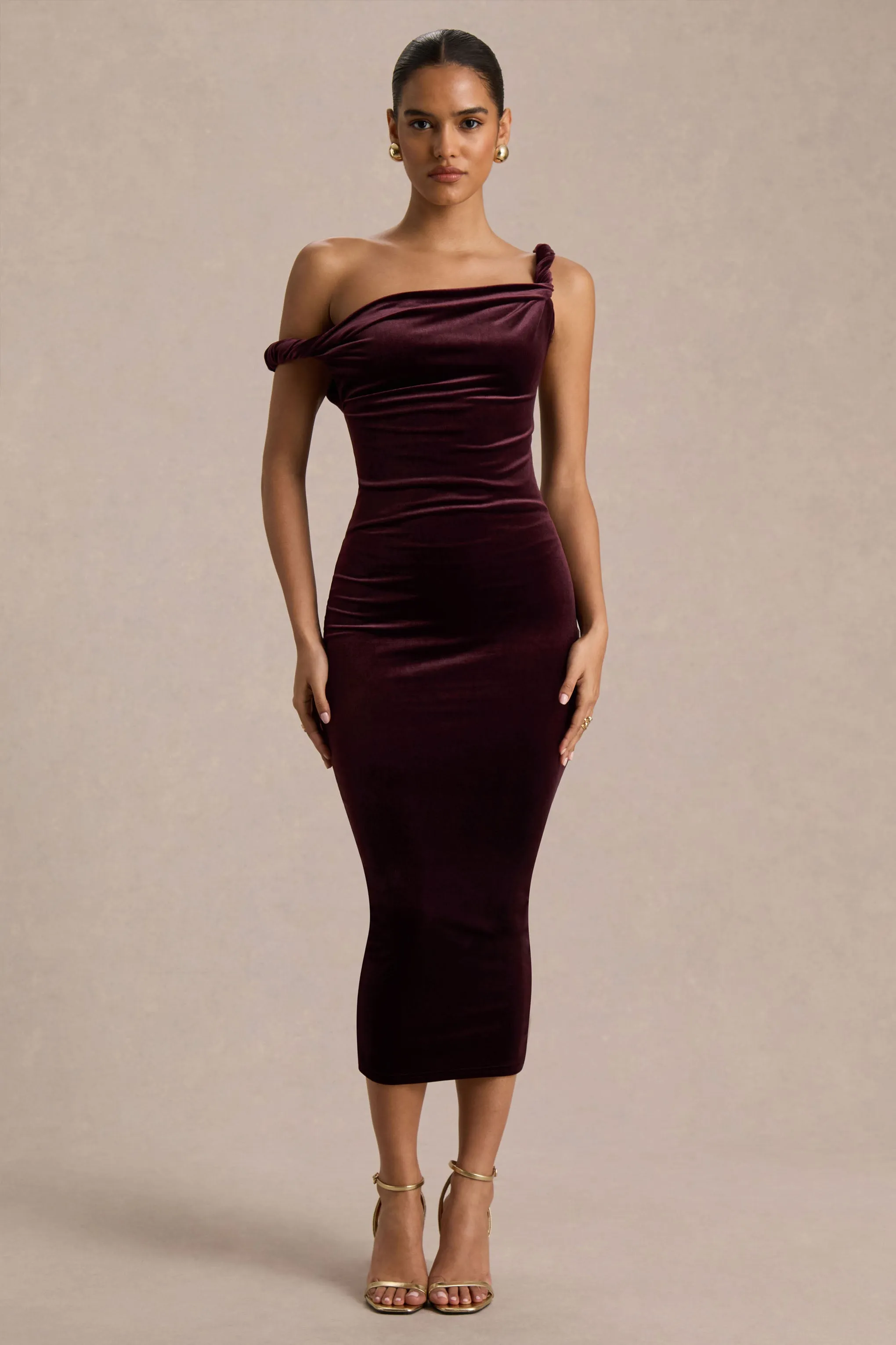 Carella | Burgundy Velvet Twisted Asymmetric Midi Dress sold by Club L London