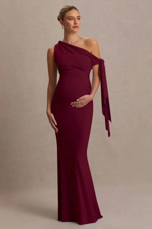 Orielle | Burgundy Asymmetric-Neck Maternity Maxi Dress With Knot-Sleeve And Sash sold by Club L London