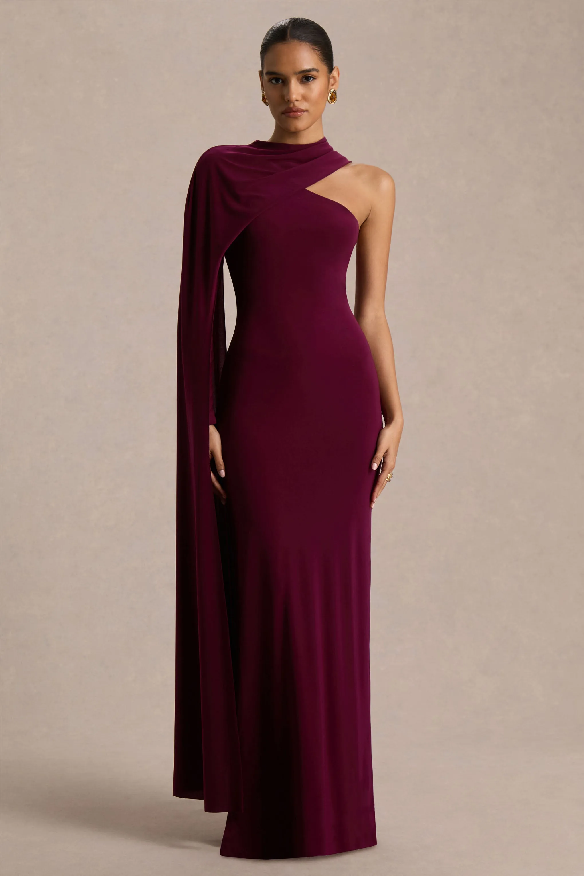 Dawn | Burgundy Asymmetric-Neck Maxi Dress With One Long-Sleeve And Cape sold by Club L London