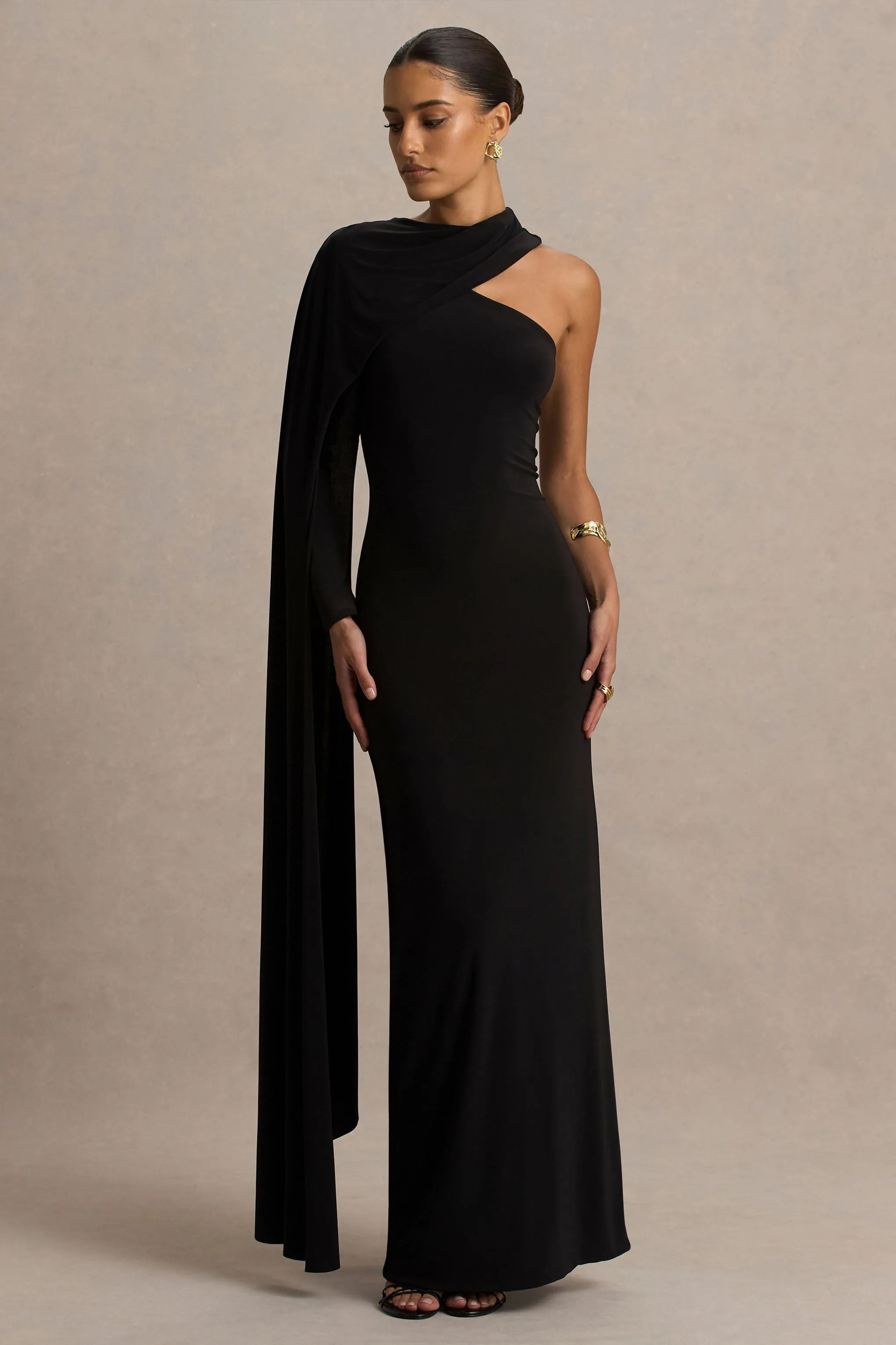 Dawn | Black High-Neck Maxi Dress With One Long Cape-Sleeve sold by Club L London